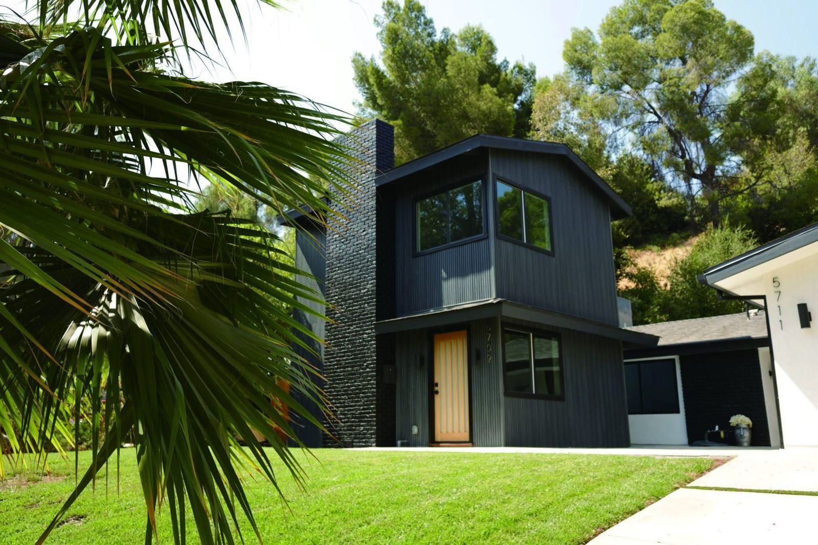 Maison habillée en bardage composite Evodek Black